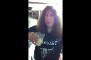 Raven Bassist John Gallagher